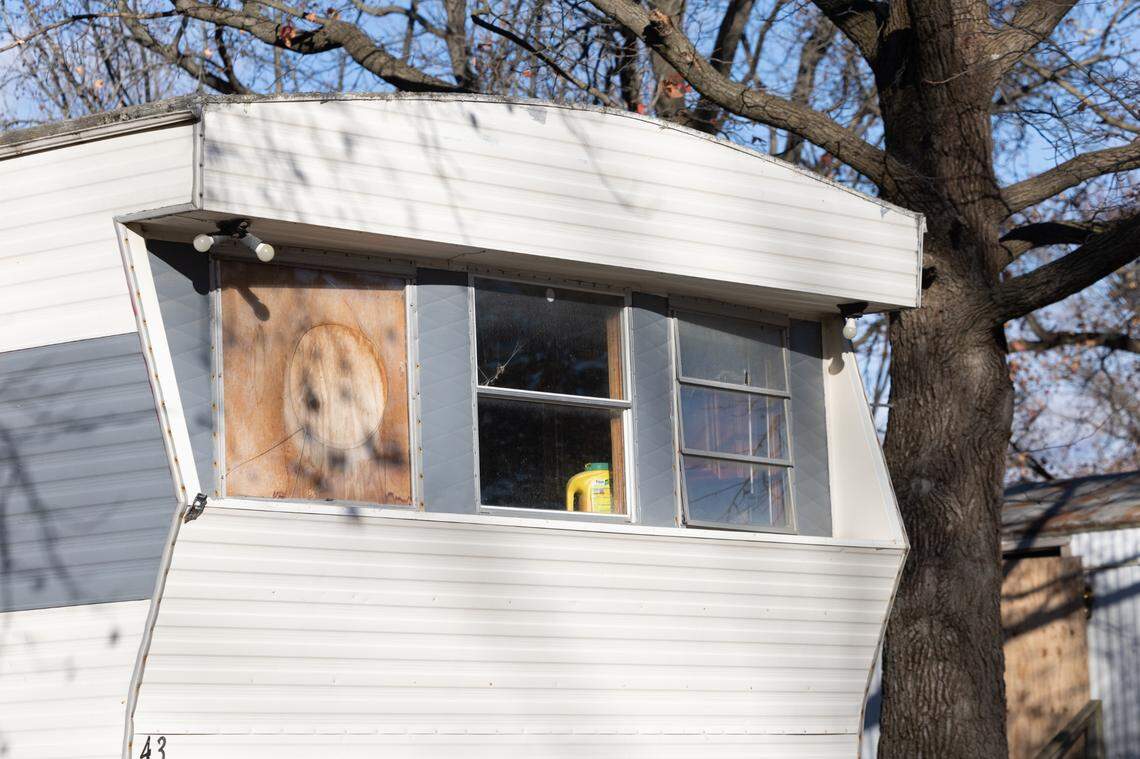 A mobile home at Brookside Mobile Home Park in Centralia has boarded up a missing window.