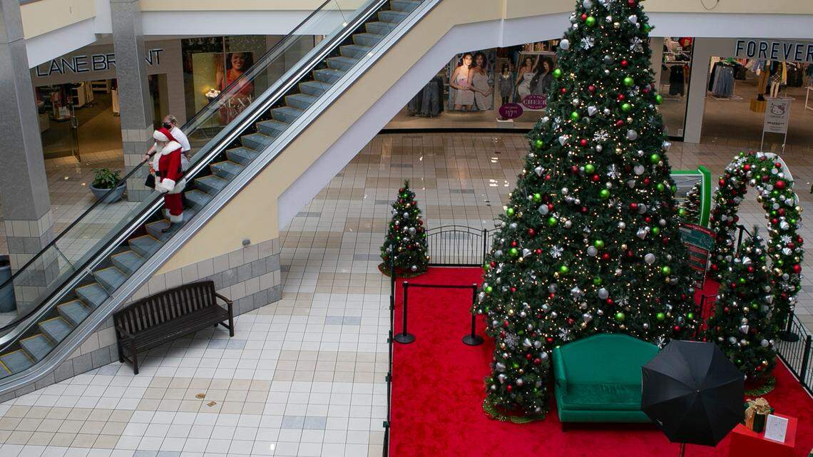Santa Claus heads to his station at St. Clair Square in Fairview Heights on Monday morning. Children are invited to stop by to give him their wish lists and pose for photos.