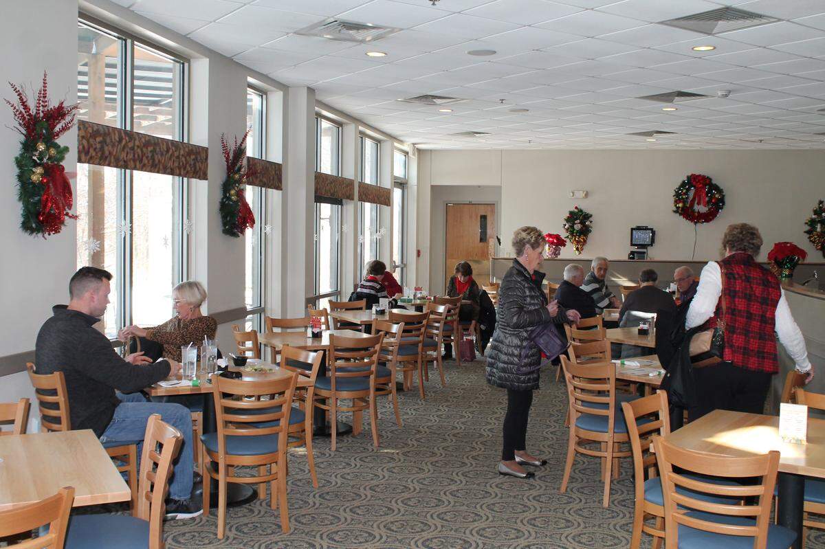 The new managers of the Shrine Restaurant, which closed Saturday, renovated with new carpeting, tables and chairs, as shown in this file photo from December.