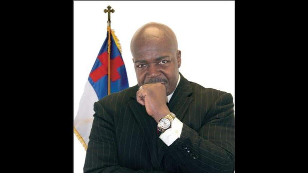 The Rev. John L. Curry
