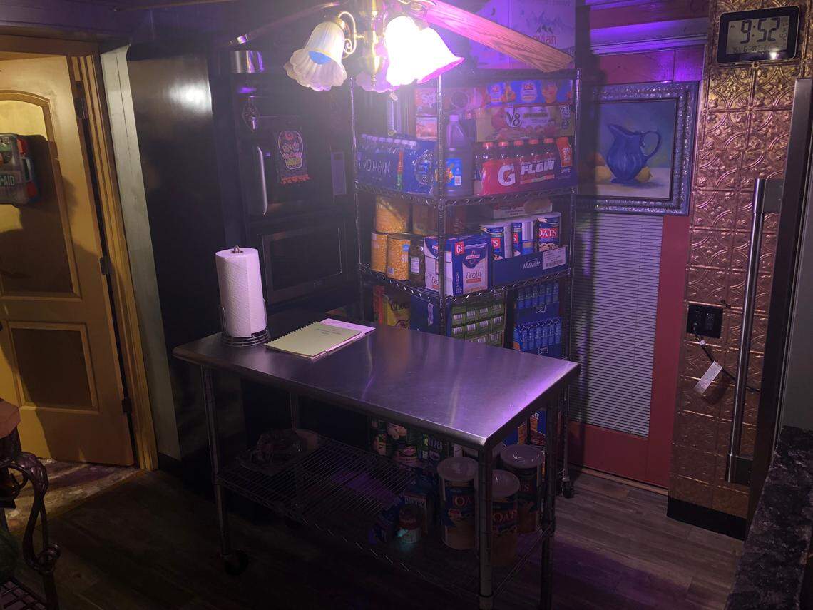 Rooms have been added and created inside the house at 40 Jarvis Place, such as this secondary kitchen where food is stored.