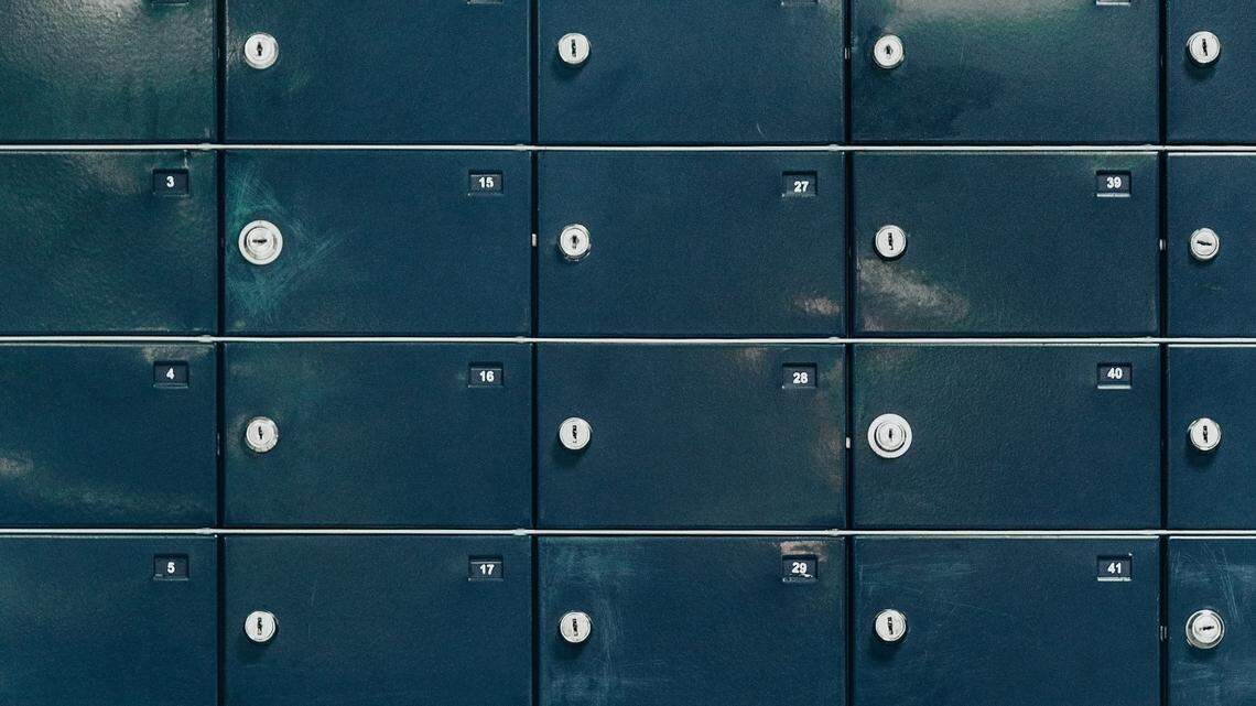 Four men stole over $400,000 from Illinois mailboxes using a stolen master key, federal officials said.