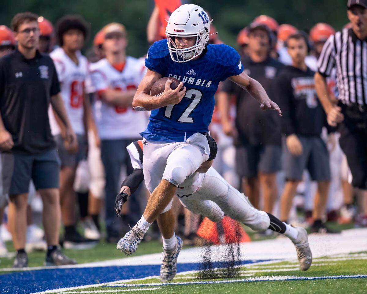 Columbia’s Dominic Voegele carries the ball during the Route 3 rivalry game between Columbia and Waterloo on this fall. Voegele, who helped the Eagles to a 9-0 win by kicking field goals of 46 and 47 yards while grabbing two interceptions, also is a star pitcher and will continue his baseball career at Kansas University.