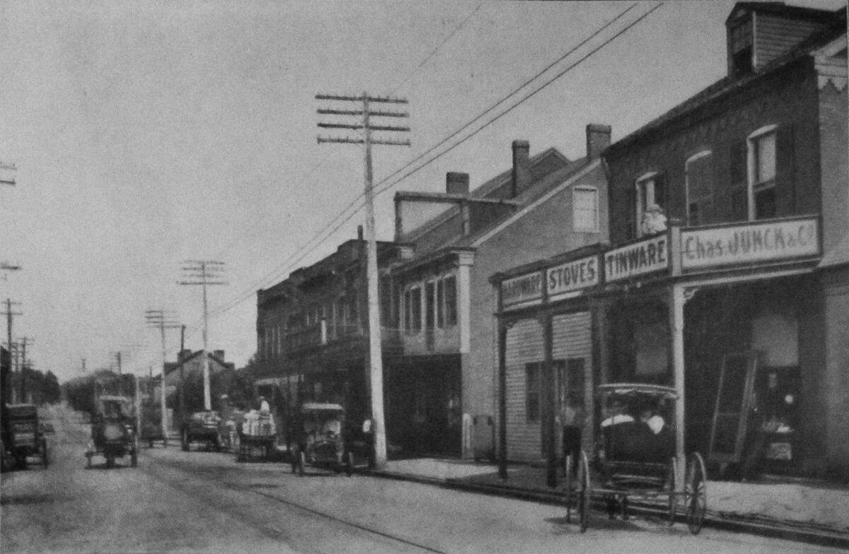 This 1910 photo shows the business district of West Belleville, by then part of Belleville. Buildings to the right, 1007-1021 W. Main St., are all still standing, albeit covered with siding or facades in some cases.