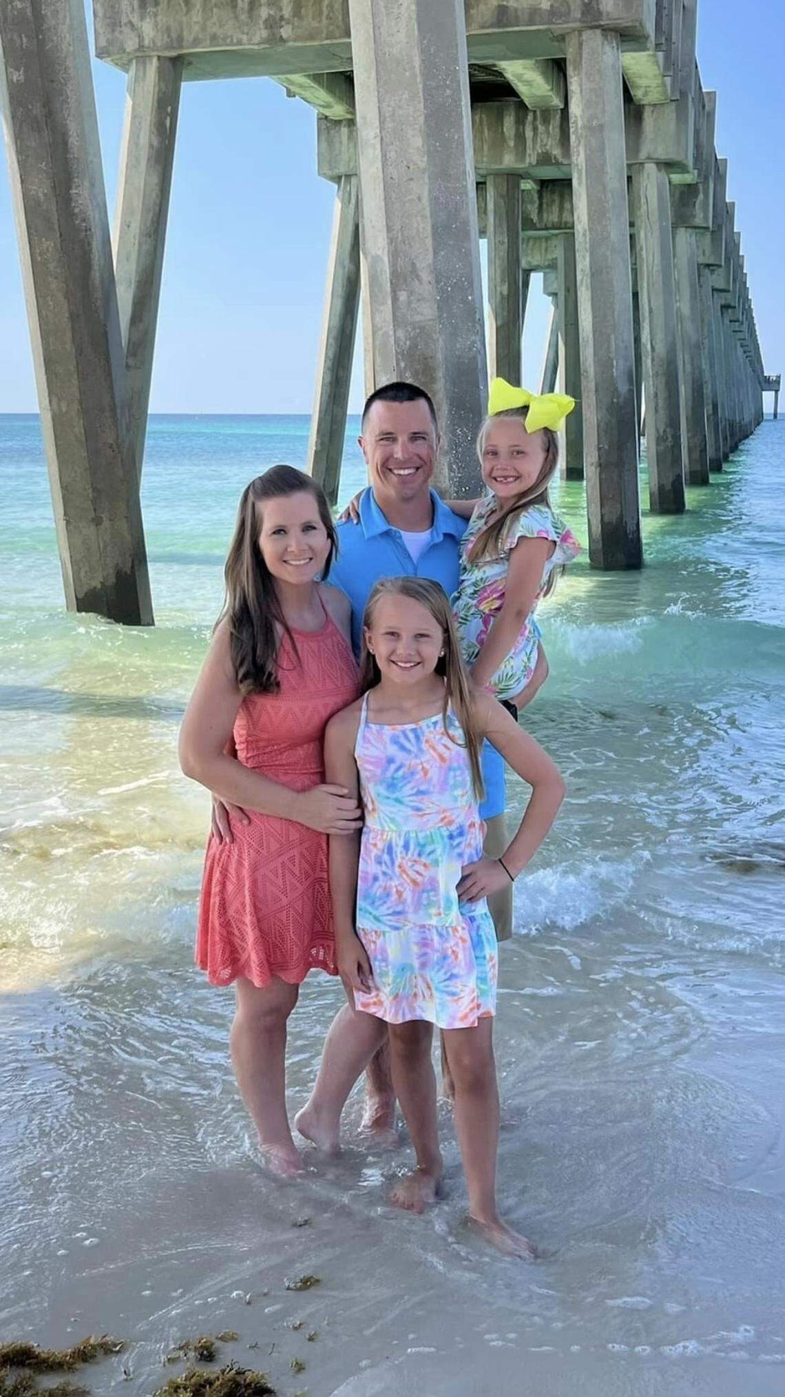 Amanda McCarty, Scott Air Force Base Annual Key Spouse Award winner, poses for a photo with her family. McCarty is the 375th Civil Engineer Squadron Key Spouse.