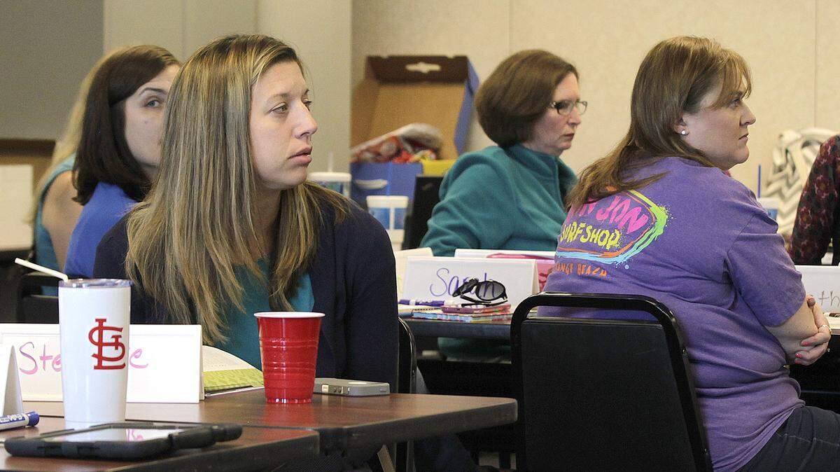 Attendees listen at the Youth Mental Health First Aid seminar, a training for teachers and school employees on issues specific to teens and how best to handle them, at the St. Clair County Regional Office of Education in Belleville.