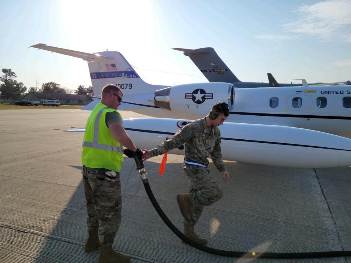 Team Scott Airman from Ground Transportation refuels a plane under the supervision of fuels management during Exercise Ballistic Badger 22.