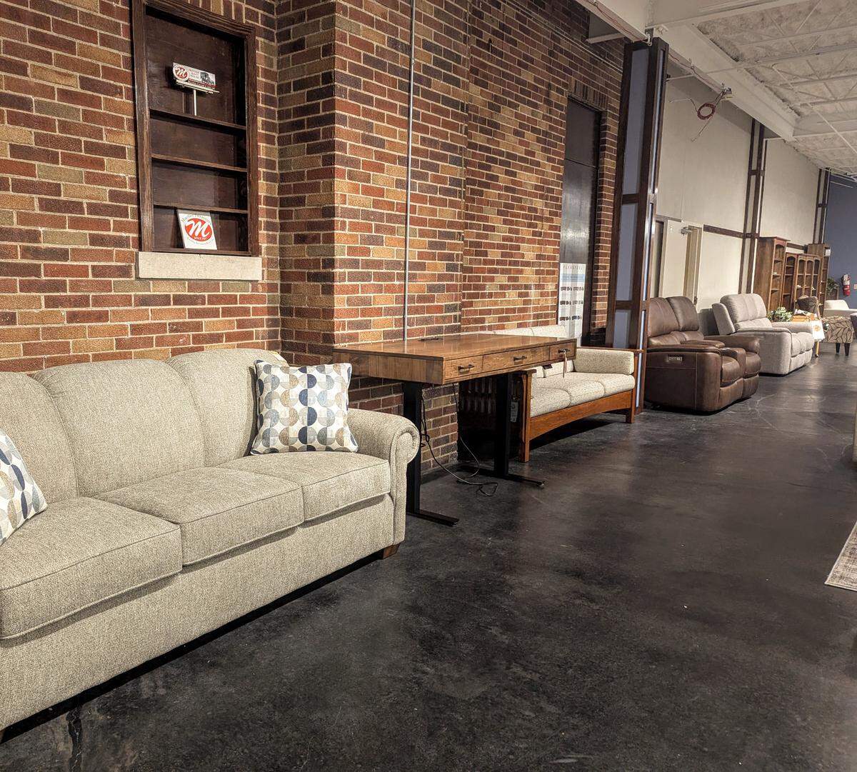 The original building’s brick wall at Mueller Furniture in Belleville was uncovered during a recent renovation project.
