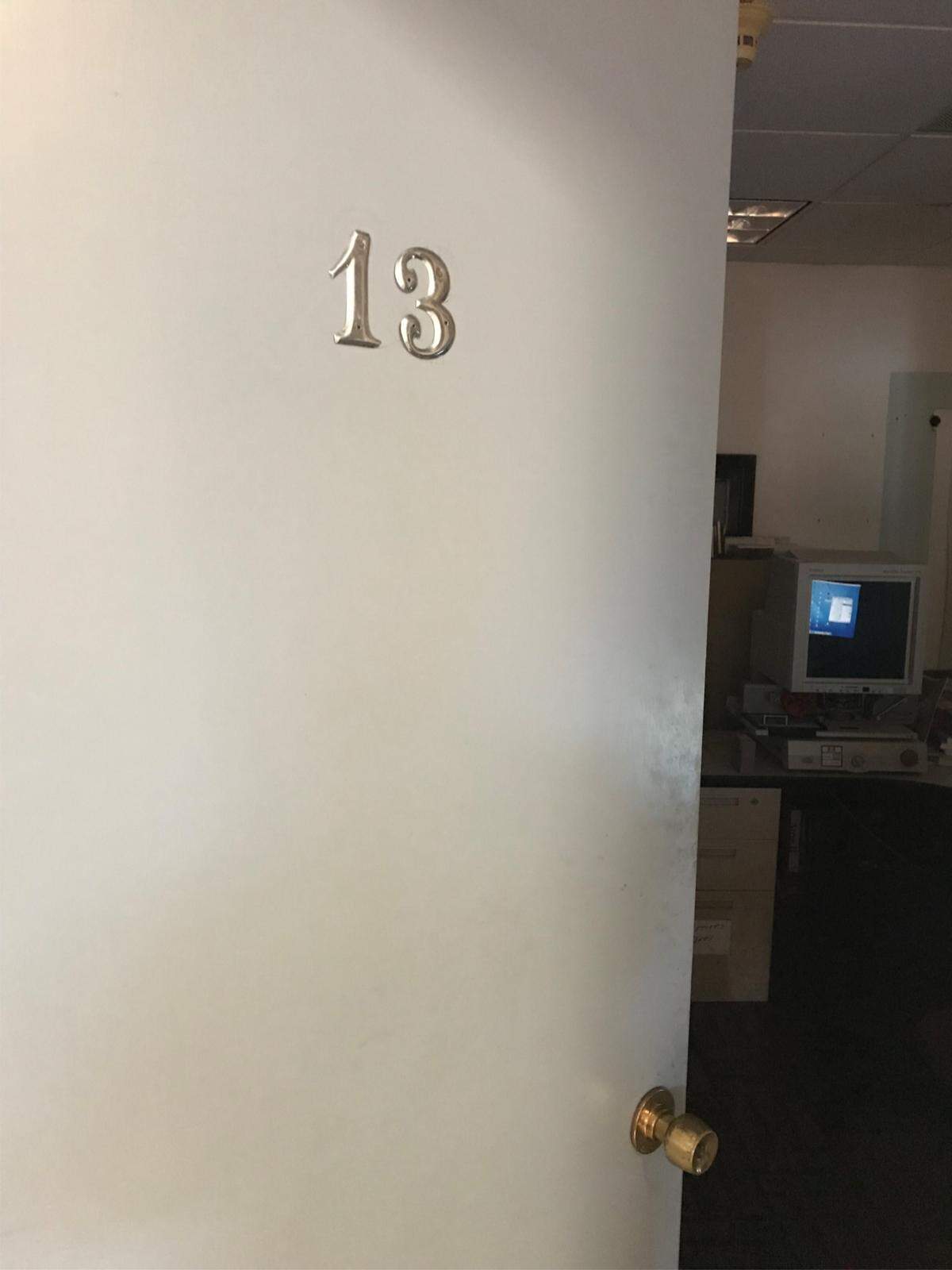The Belleville News-Democrat's most haunted location, Room 13, where columnist and resident librarian Heidi Wiechert uses the microfilm machine.