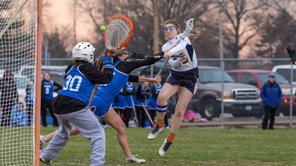 O'Fallon's Lizzy Bellina (22) shoots on goal against Westminster.