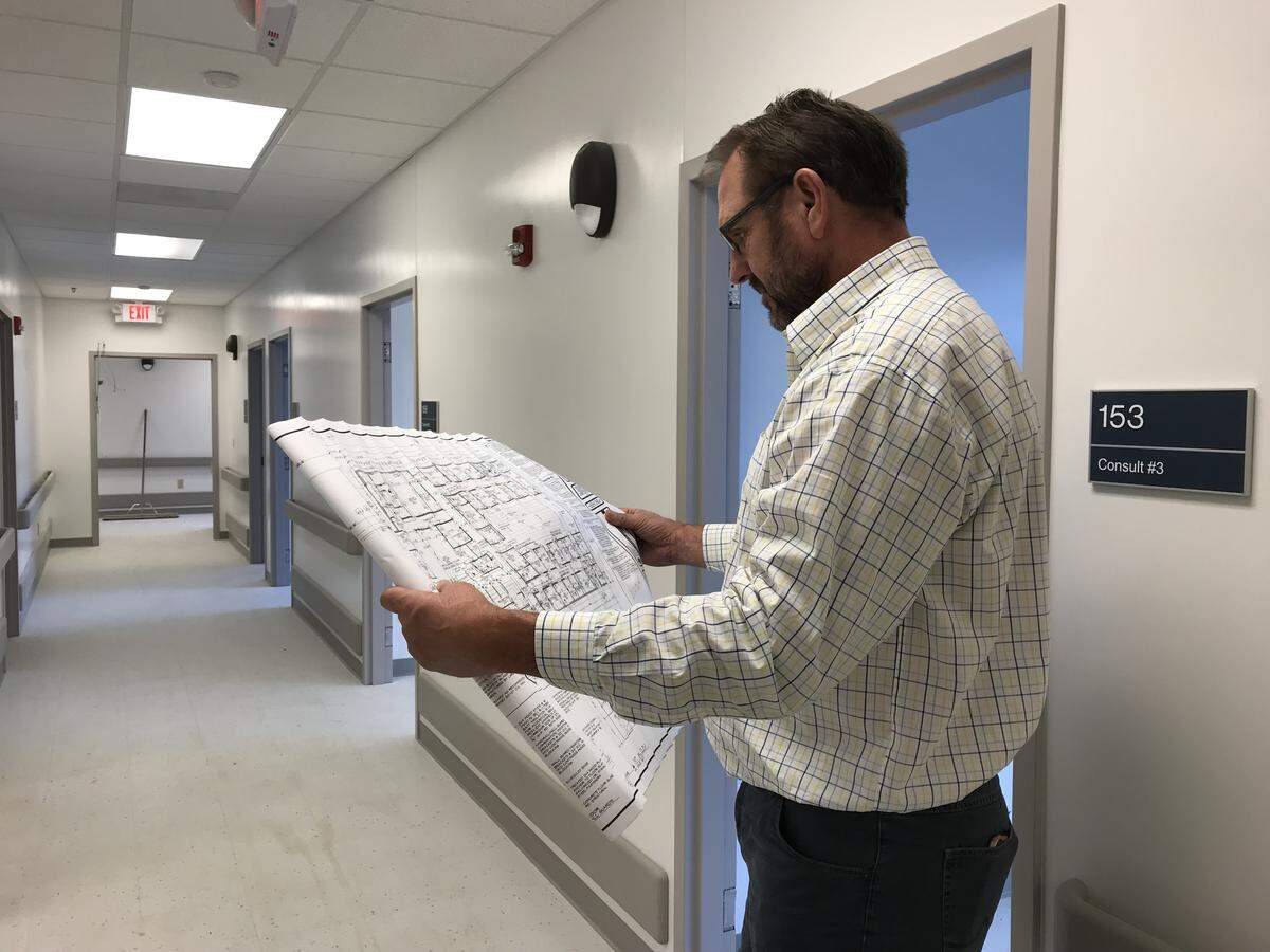 Contractor Tom Grunloh of Effingham-based Grunloh Construction stands inside one of the hallways of the nearly 13,000-square-foot, one-story outpatient St. Clair County VA Clinic in Shiloh.