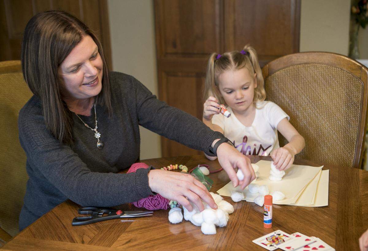 Collinsville resident Shannon Philpott-Sanders is the author of "Screen-Free Fun: 400 Activities for the Whole Family."  Here, she demonstrates some of the activities with her niece, Persephone Jaenke, 6.