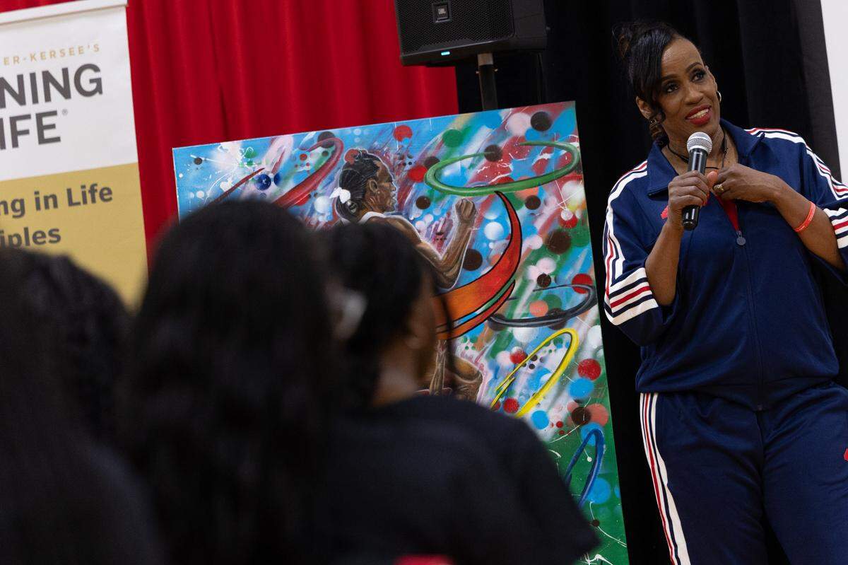 Students join in a Q&A session with Jackie Joyner-Kersee during an event for Women and Girls in Sports Day at the Jackie Joyner-Keree Center in East St. Louis on Feb. 25.