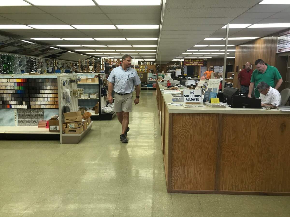 Gregg Lippert, second vice president of Liese Lumber Co. in Belleville, walks through the office and hardware store on East Main Street. He manages the company’s South Belt West location.