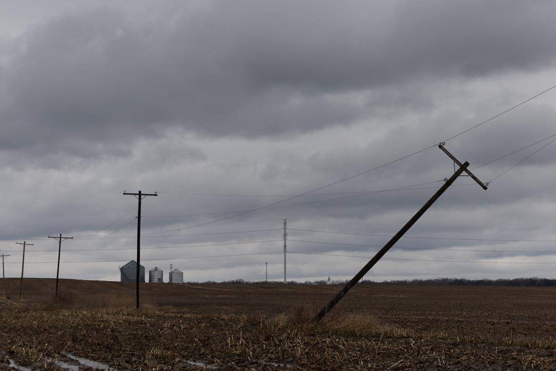 A telephone pole near Marissa, Ill. sits askew after heavy storms passed through the area Wednesday.