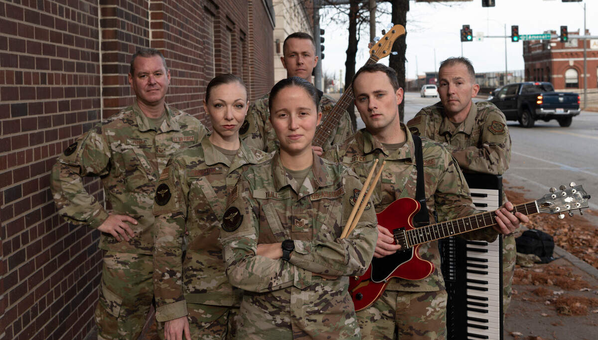 Members of Starlifter, a subset of the U.S. Air Force Band of Mid-America pose for a photo in the St. Louis area Dec. 12 Starlifter, named after the C-141 Starlifter, are part of 60 unit that performs nationally and internationally bringing merriment, espirt de corp and morale to members of the Air Force.