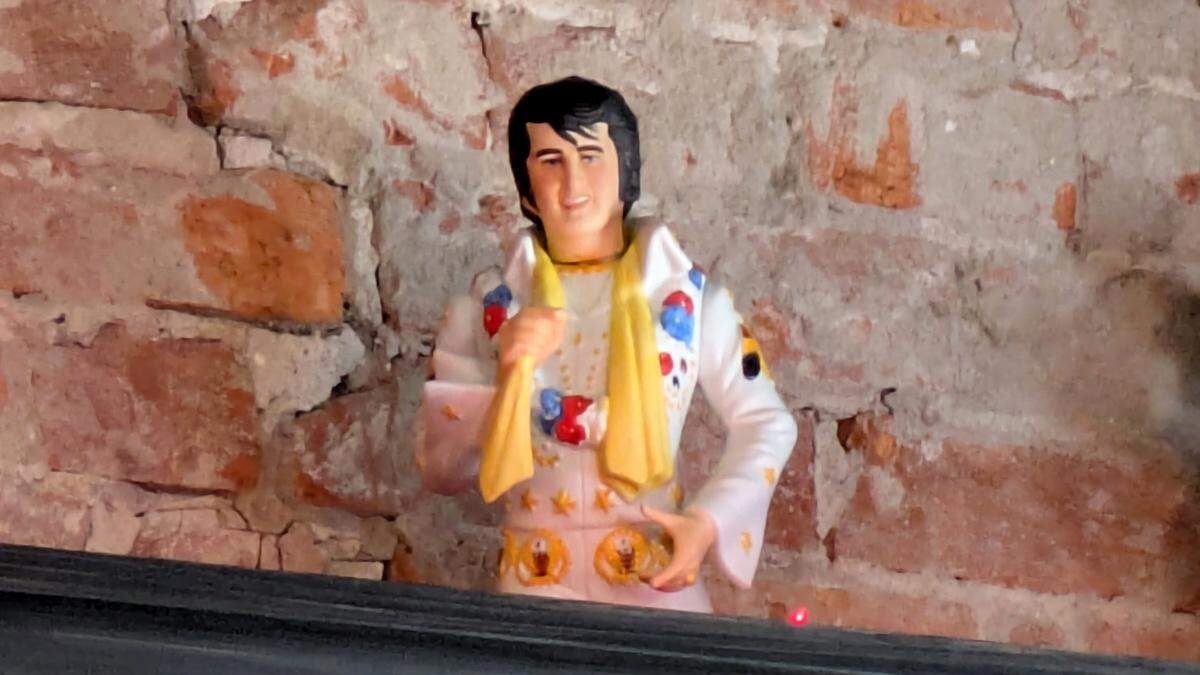 A Hawaiian Elvis decanter gives personality to The Roost.