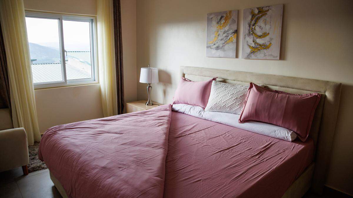 A made up bed.