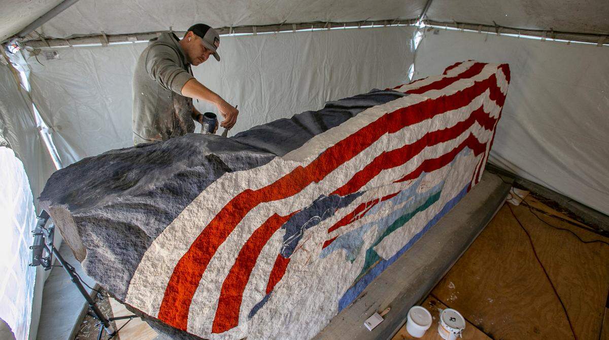 Mural Artist, Ray “Bubba” Sorensen II, paints a Freedom Rock in Shiloh. Sorensen is known for his original Freedom Rock he painted in 1999 in Iowa, now there is one in every county in Iowa. He is continuing to honor veterans with The 50 State Freedom Rock Tour by thanking Veterans and providing a unique Freedom Rock for all 50 states in America.
