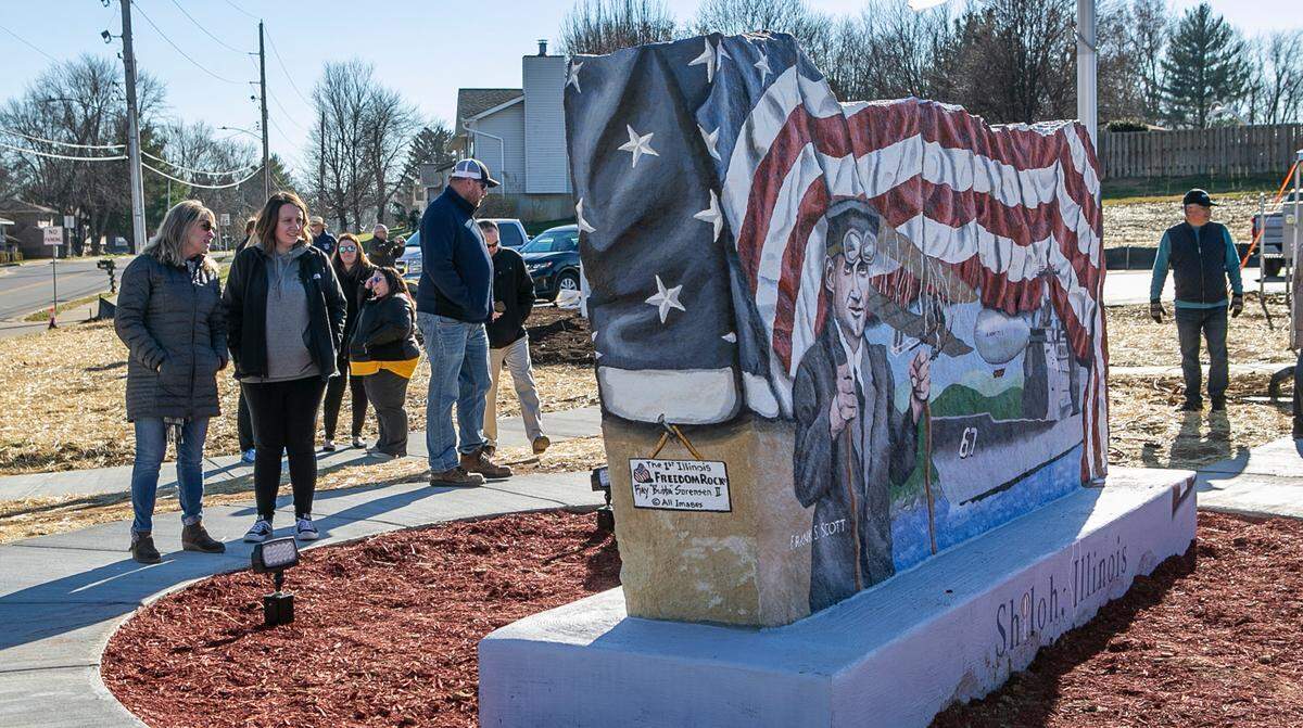 The 1st Illinois Freedom Rock, painted by Ray “Bubba” Sorensen II, was unveiled during a ceremony in Shiloh on Dec. 8. The Freedom Rock is located at the intersection of Lebanon Avenue and Shiloh Station Road. For more information on the artist and his Freedom Rock projects, visit www.thefreedomrock.com/.