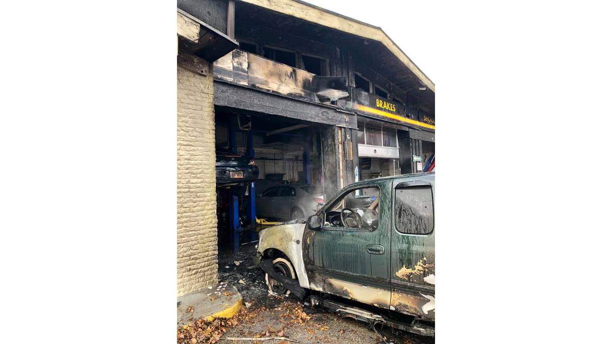 A car fire that spread into the garage at Main Street Automotive in Belleville briefly closed the road at about 8:40 a.m. Wednesday.