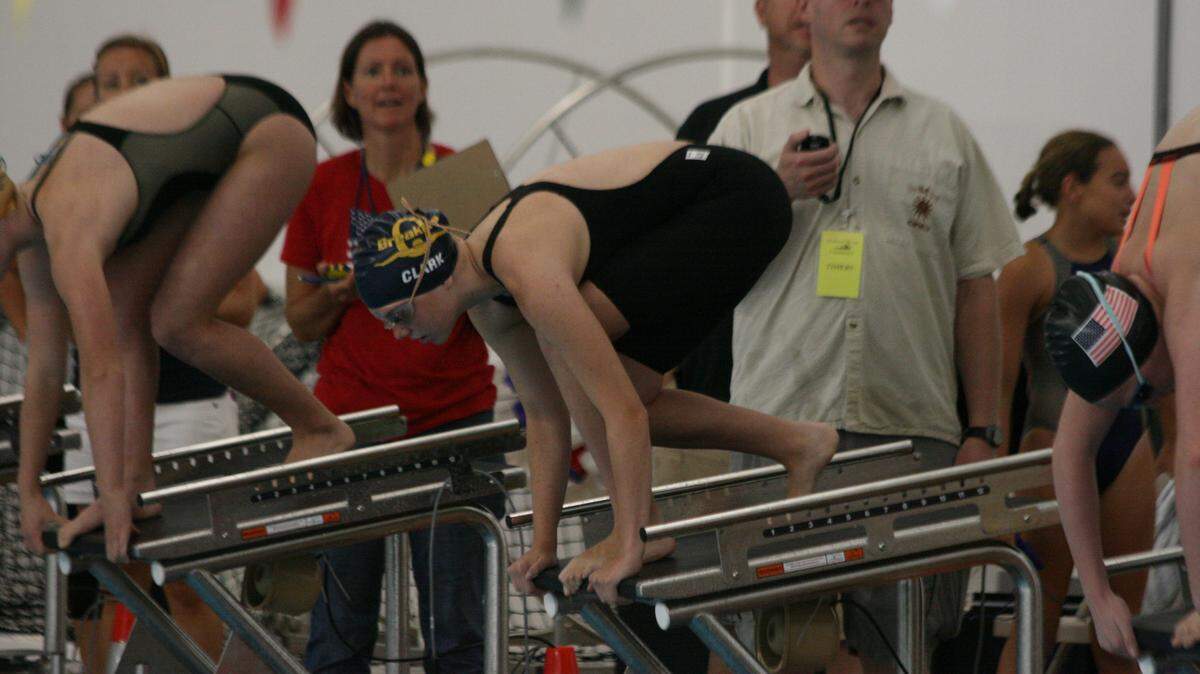 Kylie Clark readies for the start of the 100-yard freestyle at last summer's Midwest Swim Conference Championships. Open Registration for the 2018 summer season is this Saturday, April 21 at Katy Cavins Center in O'Fallon.