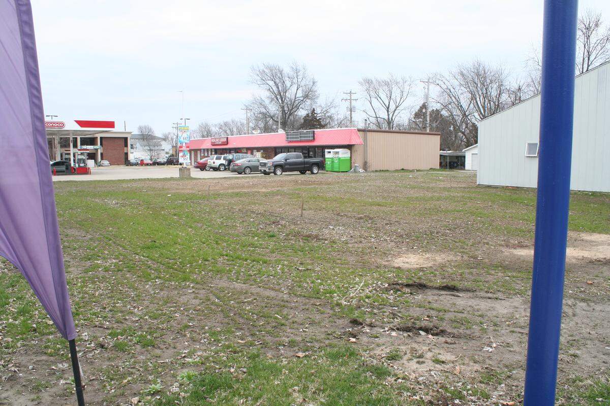 This lot at at 213 Walnut St. in Highland will be the site of a Krispy Krunchy Chicken restaurant, which will also include a bar and video gaming.