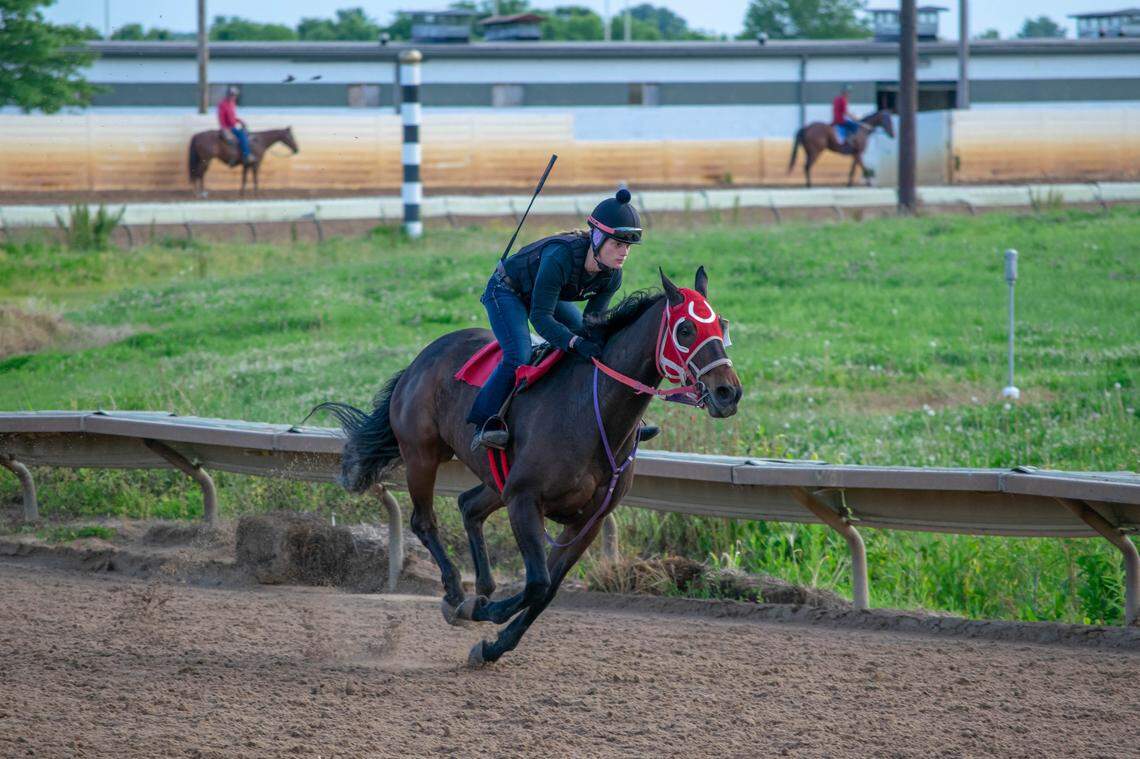 Elizabeth Thurman, the only full-time female jockey at Fairmount Park in Collinsville, works a horse in preparation for the track’s opening on Tuesday after a nearly three-month coronavirus shutdown.