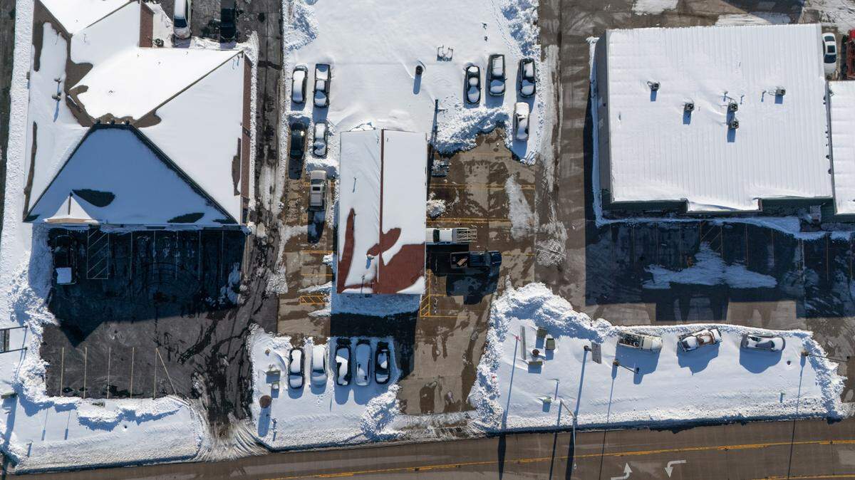 This drone photo shows 1st Class Auto Service, center, at 2339 Old Collinsville Road in Belleville on Jan. 8. The building was constructed in 1999 for a quick oil-change business.