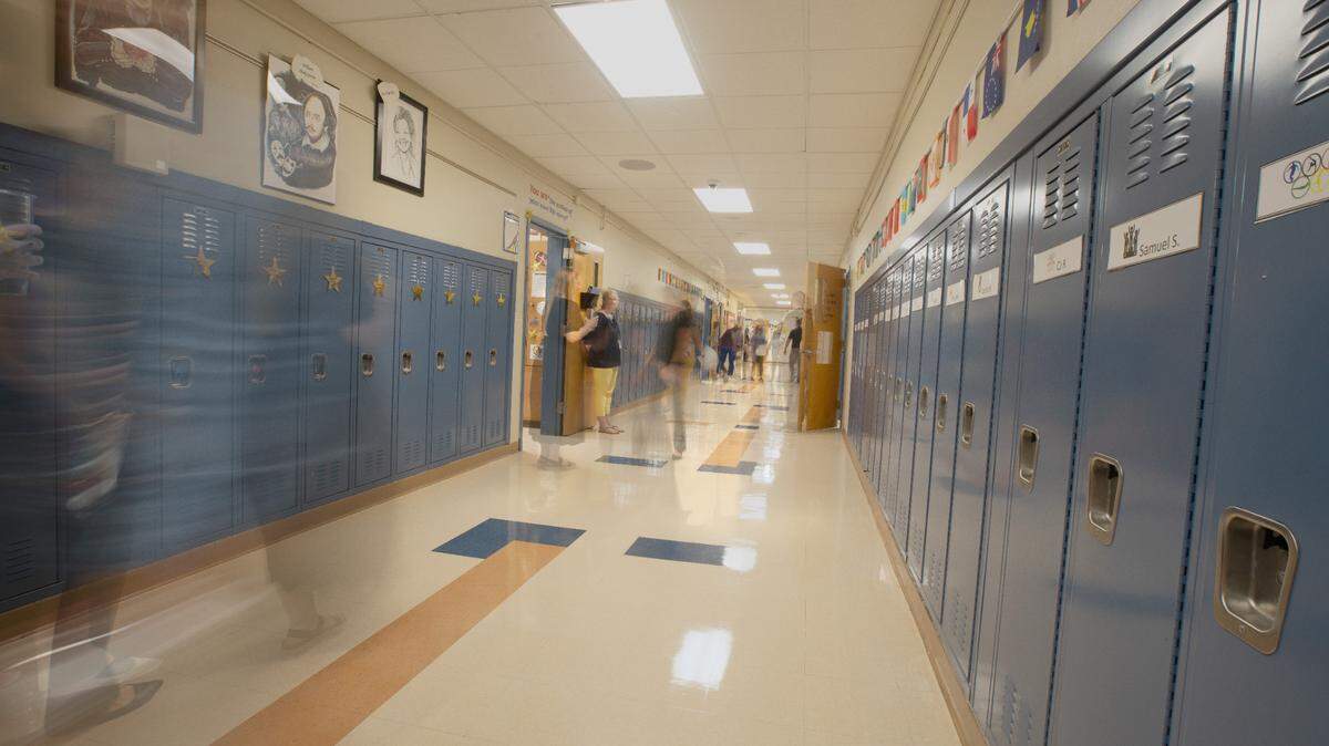 A composite photo of a hallway on Harmony Intermediate’s first day of school on Aug. 16, 2023. Harmony-Emge District 175, like other districts in the metro-east, is grappling with Illinois’ teacher shortage.