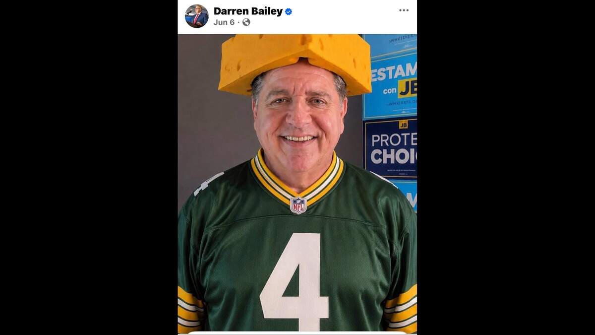 An AI-generated social media post on Illinois gubernatorial candidate Darren Bailey’ depicting JB Pritzker as a Green Bay Packers fan.