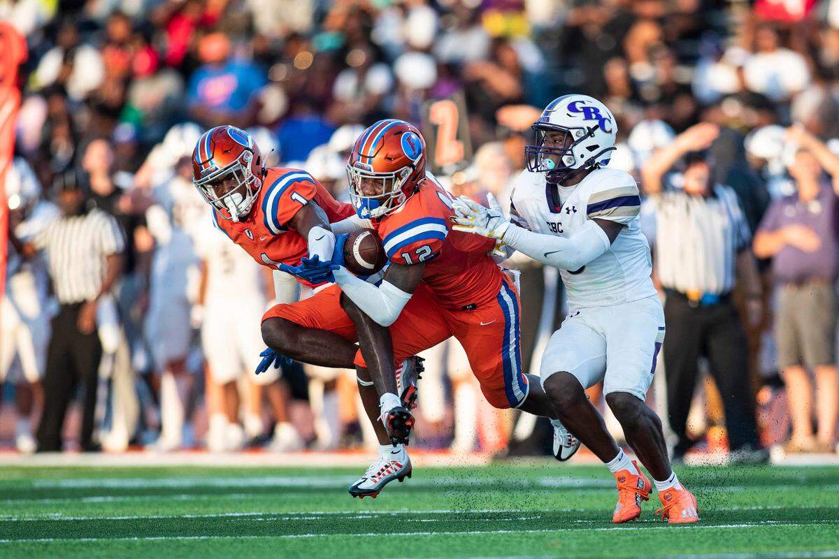 East St. Louis defensive-back Michael Tillman intercepts a CBC pass during the annual Gateway Scholars Football Classic football game earlier this season. The Flyers faced another Missouri team — De Smet — in the final game of the regular season Friday night.