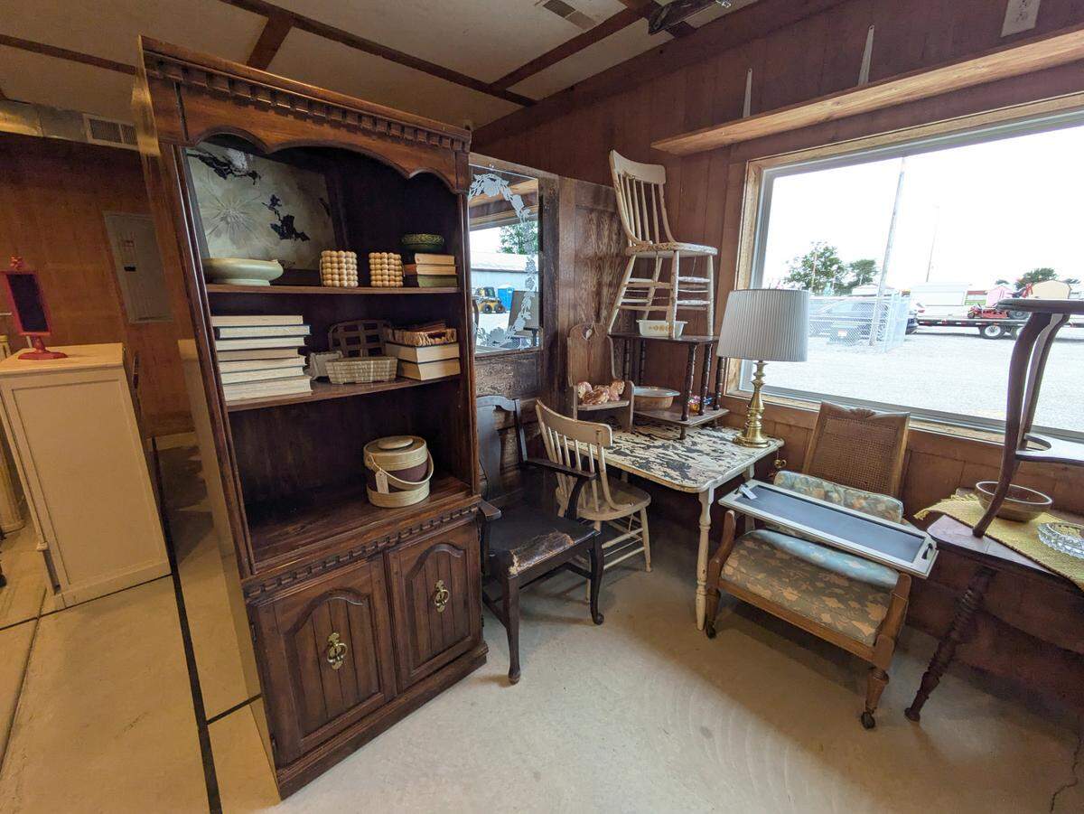 Some of the vendor booths at White Barn Antiques and Mercantile include furniture and decorative items.