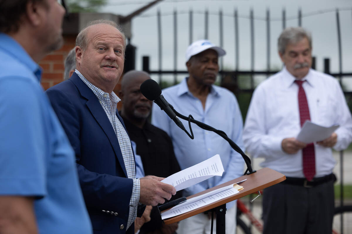 St. Clair County chairman Mark Kern speaks during the inaugural ride at the St. Clair County Transit District’s opening of its $6 million, 4.5-mile expansion of the MetroBikeLink Trail from the Scott-Shiloh MetroLink stop to MidAmerica Airport.