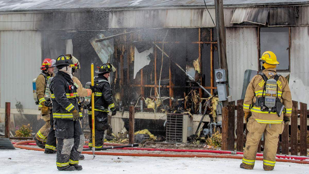 As sleet and temperatures drop, two Belleville families lose their homes in morning fire