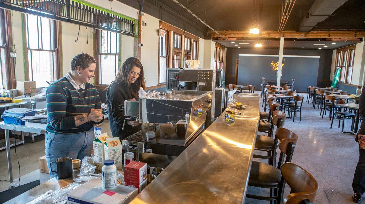 Baristas Katie O’Malley and Ashley Frierdich test out a new La Marzocco Espresso Machine inside the future LongStory Coffee café and roastery at 732 S. Illinois St. in Belleville.