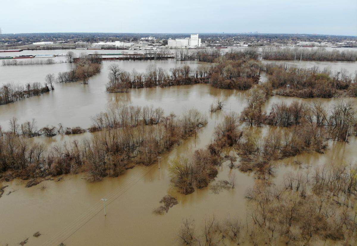 The Mississippi river is slowly creeping up the levee in East Carondelet. The photo is taken from Davis Street Ferry Road looking west towards Italgrani USA in Missouri. The Mississippi River at the Eads Bridge was at 38.34 at 2 pm., on Wednesday April 3. At 34 feet Leonor K. Sullivan Boulevard begins flooding near the Eads bridge underpass. The historic flooding in 1993 crested at 49.58 feet.