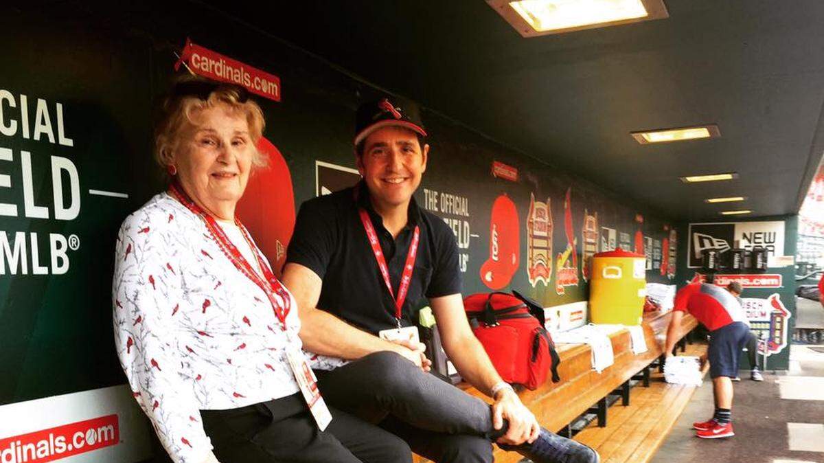 Edwardsville native A.J. Schnack has produced “Long Gone Summer,” which chronicles the 1998 home run record chase between Mark McGwire of the St. Louis Cardinals and Sammy Sosa of the Chicago Cubs. The documentary will air at 8 p.m. Sunday, June 14, on ESPN, as part of its “30 for 30” series. Schnack is pictured here with his mom in the Cardinals dugout.