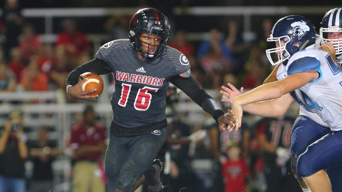 Granite City’s Freddy Edwards looks for room to run against Mater Dei.