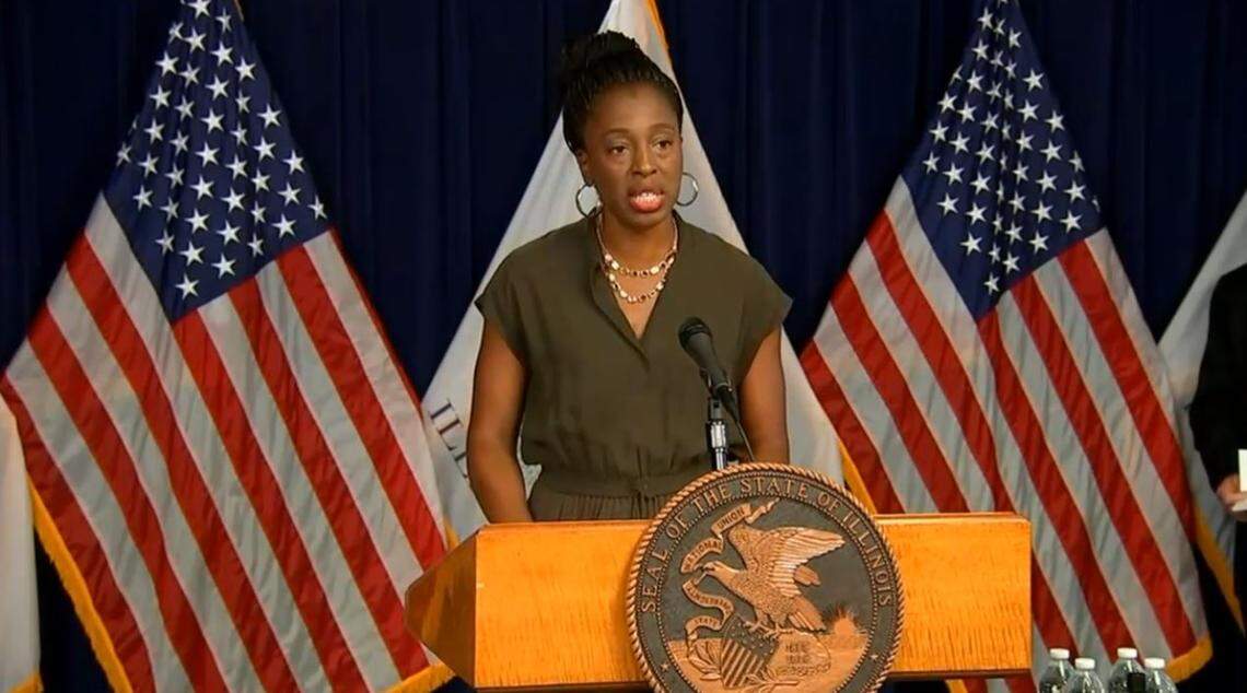 Illinois Department of Public Health Director Dr. Ngozi Ezike addresses the news media at a COVID-19 news conference in Chicago Wednesday. She stressed diligence is still needed in social distancing, wearing face coverings and washing hands as Illinois’ COVID-19 metrics continue in the wrong direction. 