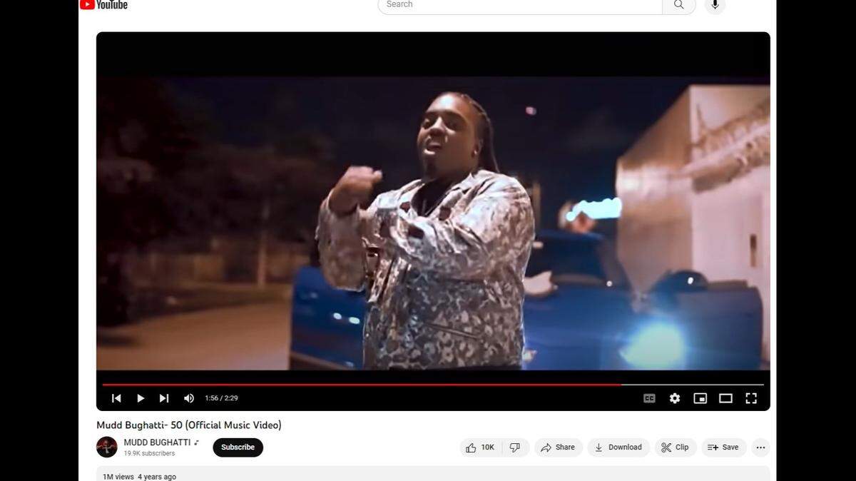 A screenshot from YouTube shows Mudd Bughatti in a video for his song “50.”