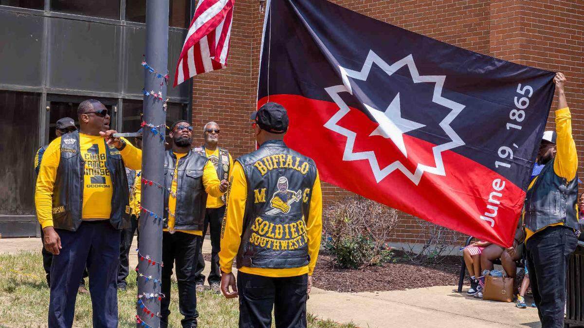 Members of Buffalo Soldiers MC Southwest Illinois participate in the raising of the Juneteenth flag in East St. Louis on June 17,2023. The ceremony was part of the metro-east’s Juneteenth celebration.