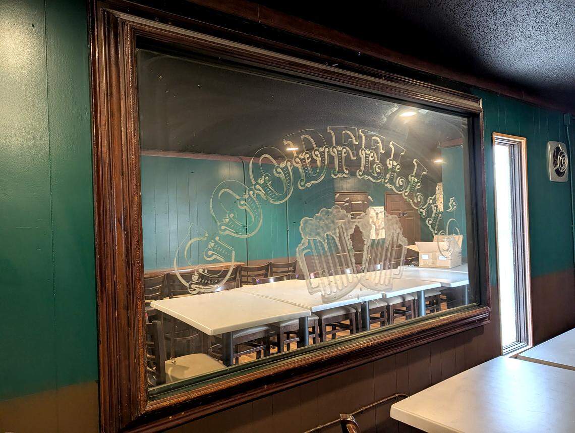 The large O'Connell's mirror will remain at Touchdown Bar & Grill in Granite City.