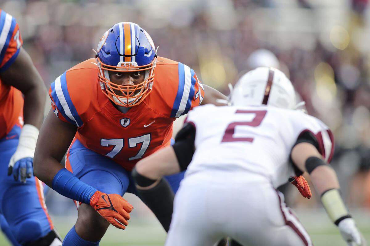 East St. Louis offensive lineman Brandon Henderson eyes up a Prairie Ridge defender during the IHSA Class 6A state championship game.