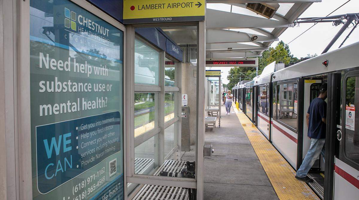 A sign for Chestnut Health Systems, on the Belleville MetroLink platform, shows some of the services they offer.