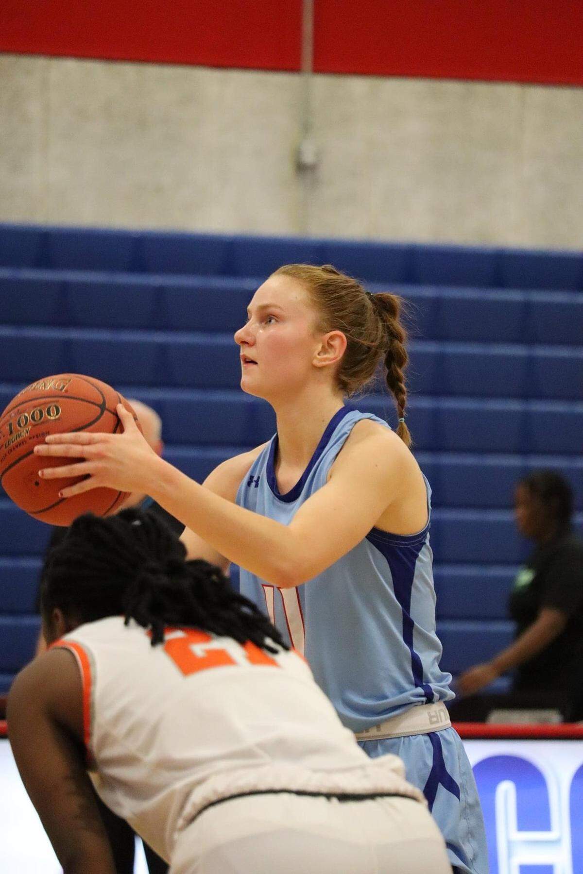 Lincoln Land guard Kirsten Taylor sets to shoot a free throw during a regular season game last season. Taylor, a Highland High School graduate, shot nearly 69% from the free throw line as a freshman while averaging 4.6 points per game.
