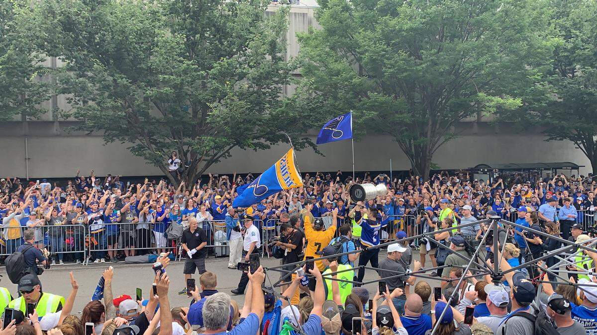 St. Louis Blues forward Patrick Maroon hoists the Stanley Cup during Saturday’s parade.