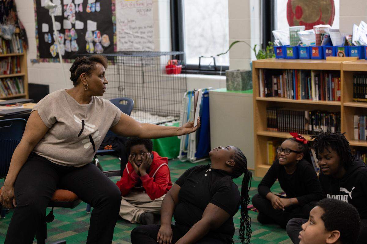Nina McLean of James Avant Elementary reads “Charlie and the Chocolate Factory” to a group of fifth graders during class. McLean was recently named Illinois Southern Regional Teacher of the Year, which means she’s a finalist for the statewide Teacher of the Year title.