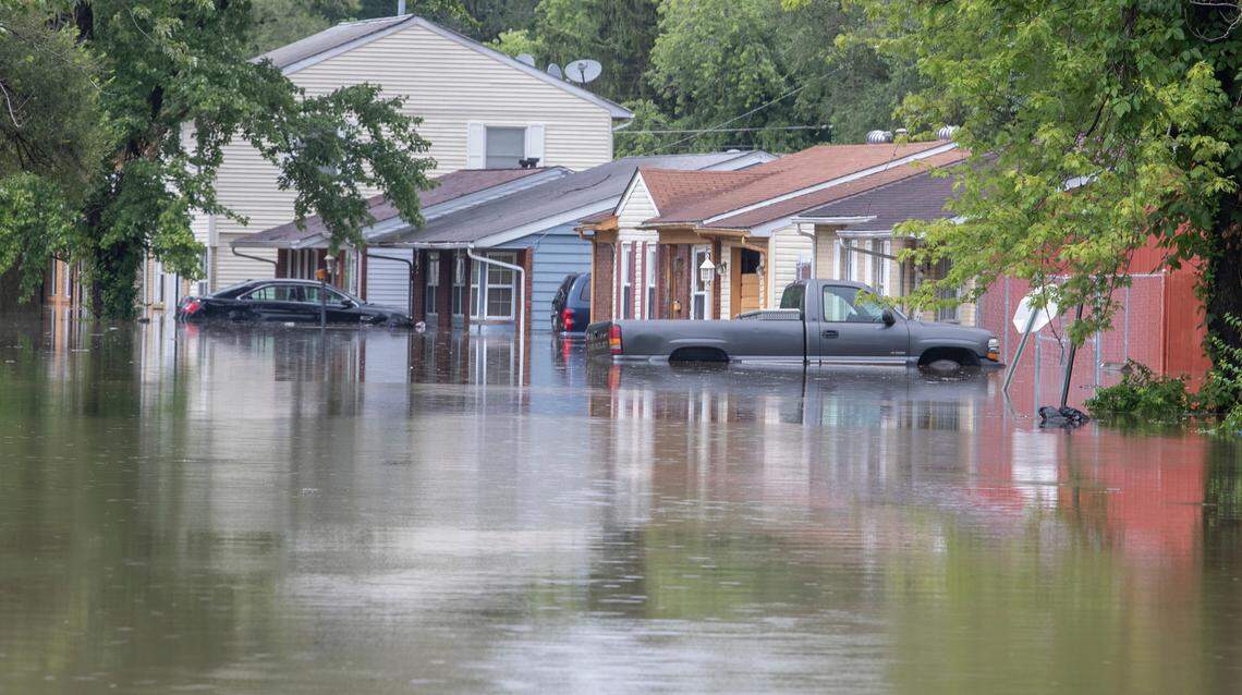 Homes and vehicles in the 600 block of Terrace Dr. in East St. Louis were flooded as water rose quickly in the area near the Harding ditch.