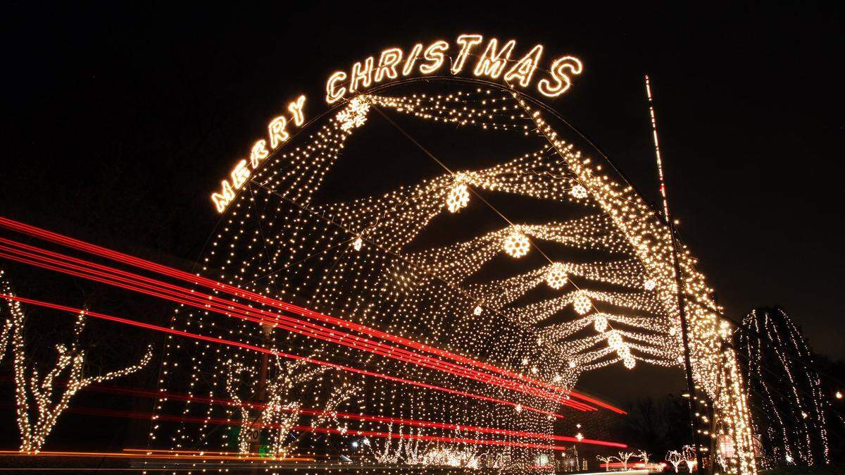 Tail lights streak through one of the first displays at the The Way of Lights in this file photo. The display takes place nightly from 5-9 p.m. through Sunday, Dec. 31. The 1.5-mile drive through scriptural Journey to Bethlehem features over 1 million lights, electro-art displays, and life-size biblical statues.